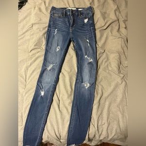 Hollister high-rise super skinny ripped jeans. Waist: 24 Length: 30